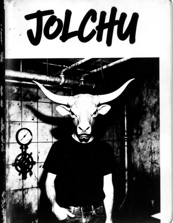 Black-and-white photocopy of a man in a bull mask with long horns in a basement full of pipes, with JOLCHU hand-lettered above