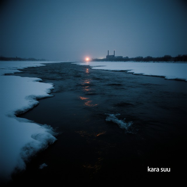 A black drainage canal between banks of snow at dusk, a refinery and a flare on the horizon